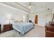 Large main bedroom with tray ceiling, carpet, and abundant natural light at 22 Oakwood Hills Dr, Suwanee, GA 30024