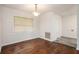 Open concept dining area featuring hardwood flooring and natural lighting at 3367 Misty Valley Rd, Decatur, GA 30032