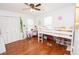 Bright bedroom featuring hardwood floors, a lofted bed, and playful decor at 3404 Vinings North Se Trl, Smyrna, GA 30080