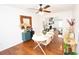 Cozy dining area featuring hardwood floors, stylish furniture, and seamless flow to an adjacent living area at 3404 Vinings North Se Trl, Smyrna, GA 30080