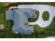 Overhead shot of a luxurious home with a winding driveway and well-maintained lawn at 140 Johnson Rd, Suwanee, GA 30024