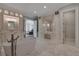 This bathroom includes a soaking tub, and vanities, and a closet at 140 Johnson Rd, Suwanee, GA 30024
