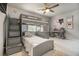 Charming bedroom featuring bunkbeds, a desk area, and soft gray tones throughout at 180 Spring Ridge Trace, Roswell, GA 30076