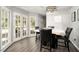A bright breakfast nook with French doors at 180 Spring Ridge Trace, Roswell, GA 30076