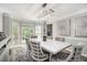 Inviting dining room with large windows at 180 Spring Ridge Trace, Roswell, GA 30076