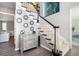 Elegant foyer with staircase, decorative mirrors, and hardwood floors at 180 Spring Ridge Trace, Roswell, GA 30076