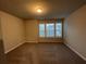Carpeted bedroom featuring a window letting in natural light at 2458 Morgan Creek Rd, Buford, GA 30519