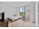 Bright bedroom featuring plush carpet, large windows, and modern furnishings at 2626 Peachtree Nw Rd # 606, Atlanta, GA 30305