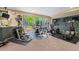 Well-equipped fitness center with a variety of exercise machines and large windows for natural light at 2626 Peachtree Nw Rd # 606, Atlanta, GA 30305