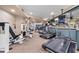 Spacious gym with treadmills, weight machines, and mirrored walls, offering a complete fitness experience at 2626 Peachtree Nw Rd # 606, Atlanta, GA 30305