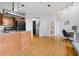 Open-concept living area featuring hardwood floors, recessed lighting, and an efficient kitchen at 2626 Peachtree Nw Rd # 606, Atlanta, GA 30305