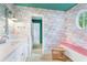 Eclectic bathroom with flamingo wallpaper, accent lighting, and vanity with a stone countertop at 2773 Brookgrove Se Ln, Atlanta, GA 30339