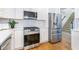 Updated kitchen with stainless steel appliances, quartz countertops, and white subway tile backsplash at 2773 Brookgrove Se Ln, Atlanta, GA 30339