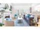 Bright living room featuring a fireplace, built-in shelving, and stylish furniture at 2773 Brookgrove Se Ln, Atlanta, GA 30339