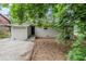 Rear view of the home showcasing the fenced yard and back door at 2796 Green Trail Dr, Atlanta, GA 30349