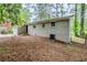 Picture of the home's backyard with an AC unit shown next to the house at 2796 Green Trail Dr, Atlanta, GA 30349