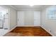 Dining room with hardwood floors and natural light from the window at 2796 Green Trail Dr, Atlanta, GA 30349