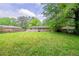 A look at the grassy backyard of the property at 3497 Glensford Dr, Decatur, GA 30032