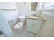 Updated bathroom featuring granite vanity top, white cabinet and new toilet at 3497 Glensford Dr, Decatur, GA 30032