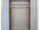Spacious walk-in closet featuring an adjustable shelf for easy organization at 3497 Glensford Dr, Decatur, GA 30032