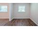 Bright dining room featuring new floors and natural lighting through large windows at 3497 Glensford Dr, Decatur, GA 30032