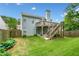 A well-maintained backyard features a two-tiered deck and a grassy area at 1452 Evanston Ln, Marietta, GA 30062