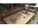 Plenty of room to play on this fenced playground with slides, swings, climbing gym, and picnic tables at 1452 Evanston Ln, Marietta, GA 30062