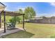 This spacious backyard features a covered patio and lots of green space at 2602 Midler Ct, Buford, GA 30519