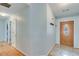 Entryway with hardwood floors, a decorative door, and coat rack at 2602 Midler Ct, Buford, GA 30519
