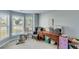 Cozy sitting room featuring a bay window that floods the space with natural light, perfect for relaxation or a home office at 2602 Midler Ct, Buford, GA 30519