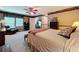 Bright, carpeted bedroom with an open closet and a comfortable sitting area at 3220 Stoney Acres Nw Dr, Kennesaw, GA 30152
