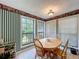 Bright breakfast nook featuring a round table, natural lighting, and charming wallpaper accents at 3220 Stoney Acres Nw Dr, Kennesaw, GA 30152