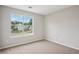 Bright bedroom with a large window and neutral decor at 5447 Lauren Cv, Ellenwood, GA 30294