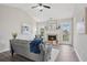 Inviting living room with vaulted ceilings, a fireplace, hardwood floors, and neutral color palette at 5447 Lauren Cv, Ellenwood, GA 30294