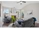 Inviting living room with vaulted ceilings, a cozy fireplace, hardwood floors, and a neutral color palette at 5447 Lauren Cv, Ellenwood, GA 30294