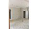 Living room with neutral walls, white trim, and two doorways, ready for finishing touches at 816 Proctor Rd, Rockmart, GA 30153