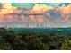 Panoramic view of the city skyline with striking clouds, creating a picturesque backdrop at 4100 Paces Se Walk # 4306, Atlanta, GA 30339