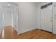 Bright entryway featuring hardwood floors and classic white trim with closet at 4100 Paces Se Walk # 4306, Atlanta, GA 30339