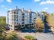 Multi-story apartment building with balconies and ample parking at 4100 Paces Se Walk # 4306, Atlanta, GA 30339