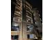 Elegant building exterior with stone accents, balconies, and covered parking areas at 4100 Paces Se Walk # 4306, Atlanta, GA 30339