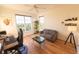 Bright living room featuring hardwood floors, large windows and a comfortable seating area at 4100 Paces Se Walk # 4306, Atlanta, GA 30339