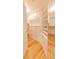 Spacious walk-in closet with custom built-in shelving and drawers for optimal organization at 4100 Paces Se Walk # 4306, Atlanta, GA 30339