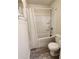 A clean bathroom with a shower, tub, and toilet at 4173 Stillwater Dr, Duluth, GA 30096