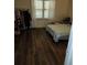 Inviting bedroom with hardwood floors and a large window for natural light at 4173 Stillwater Dr, Duluth, GA 30096