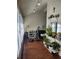 Bright sunroom with plants and natural light, perfect for relaxation and hobbies at 4173 Stillwater Dr, Duluth, GA 30096