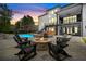 Inviting backyard with a pool, fire pit, and comfortable seating, perfect for outdoor relaxation at 575 Indian Hills Pkwy, Marietta, GA 30068