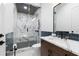 Bathroom featuring a walk-in shower, dual vanity with quartz countertops, and modern fixtures at 575 Indian Hills Pkwy, Marietta, GA 30068
