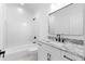 Bathroom featuring granite countertop, black fixtures, white subway tile and a shower/tub combo at 575 Indian Hills Pkwy, Marietta, GA 30068