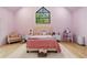 Charming bedroom with vaulted ceilings, complemented by a soft color palette and natural light at 575 Indian Hills Pkwy, Marietta, GA 30068