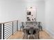 Dining area features hardwood floors and table with seating for six at 575 Indian Hills Pkwy, Marietta, GA 30068